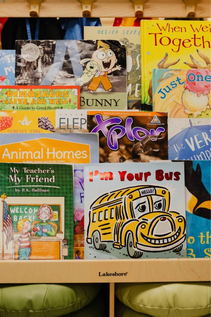 A children's library bookshelf with age-appropriate books.
